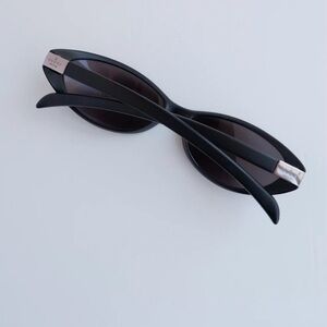 Gucci Black Oval Sunglasses